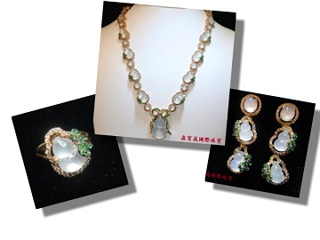 A suite of icy white jadeite gourd and diamond jewellery