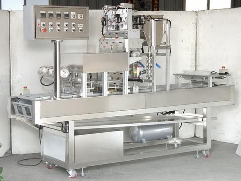 Fully automatic tray sealing machine