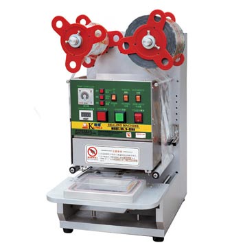 AUTOMATIC SEALING MACHINE