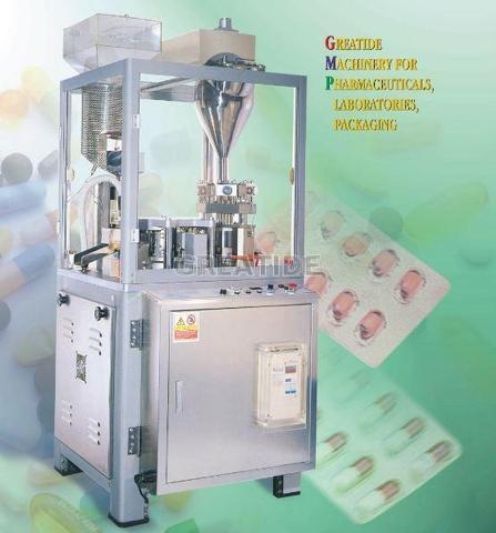 AUTOMATIC CAPSULE FILLING MACHINE